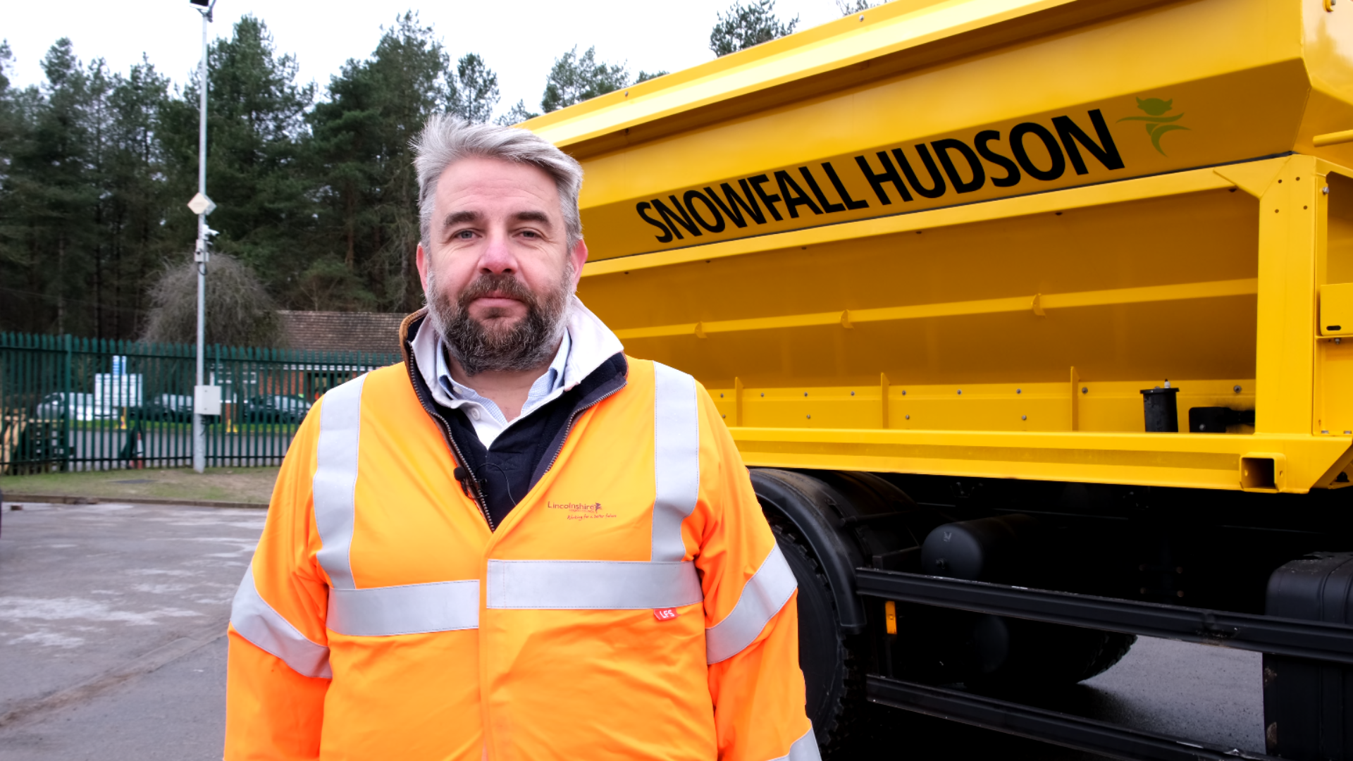 Cllr Richard Davies in front of gritter