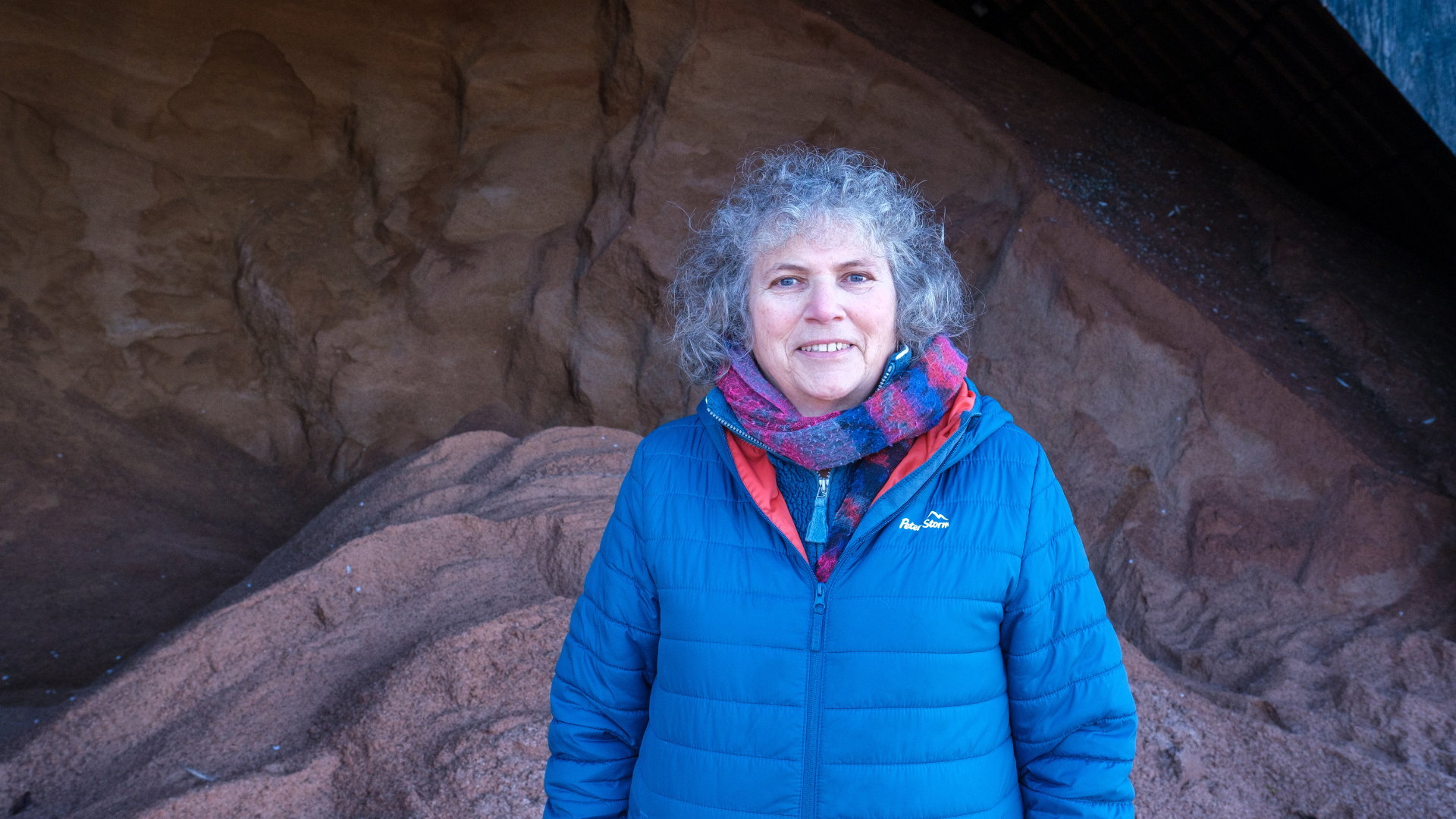 Jan Phillips in front of salt pile