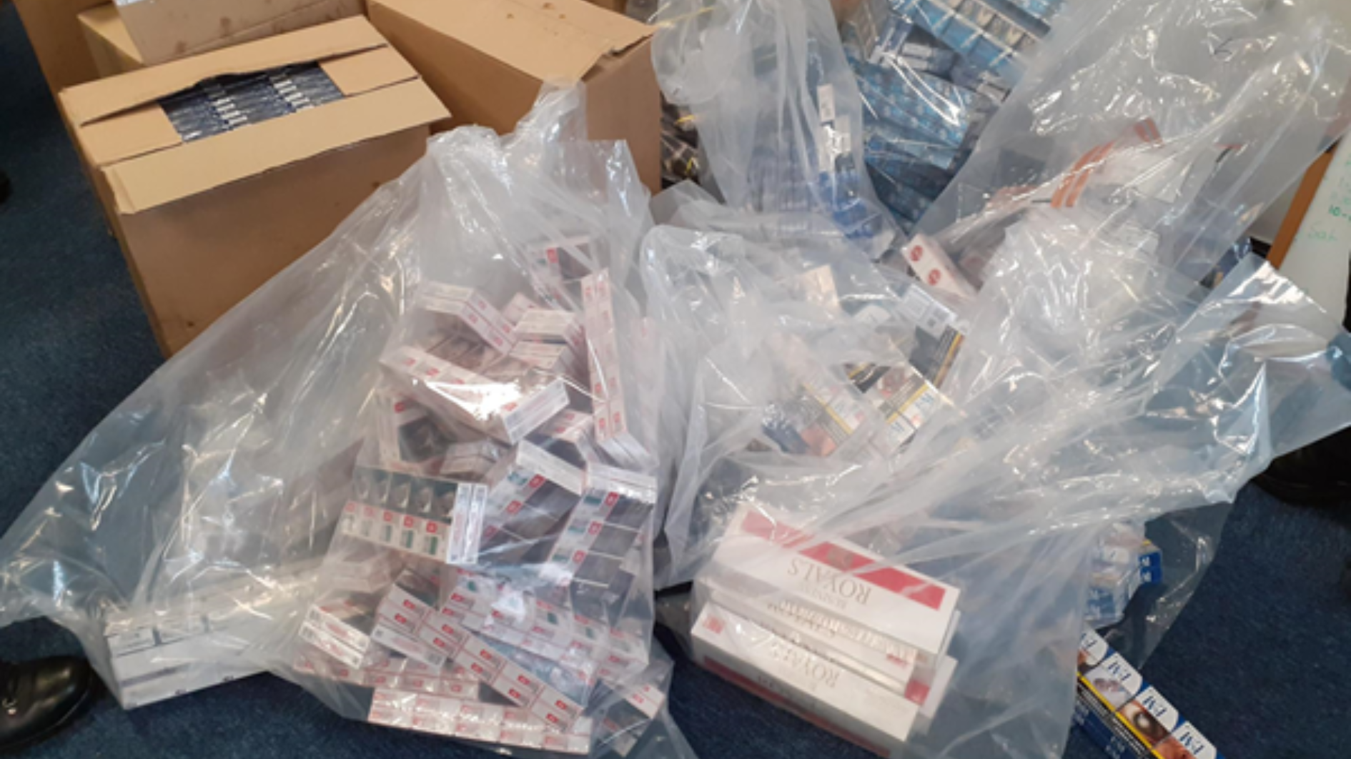 Boxes and bags full of illegal cigarettes