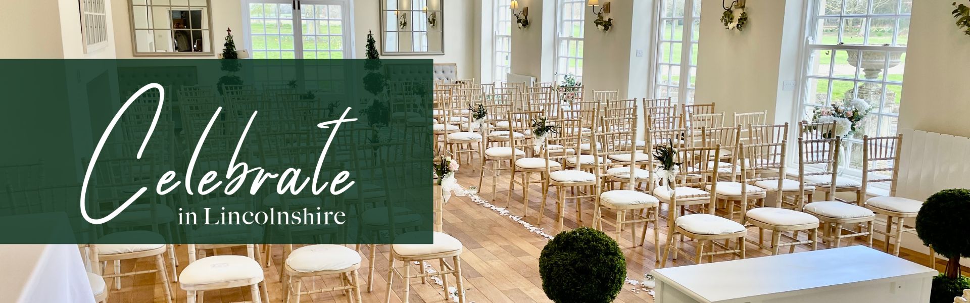 A wedding ceremony set up with chairs for guests and flowers