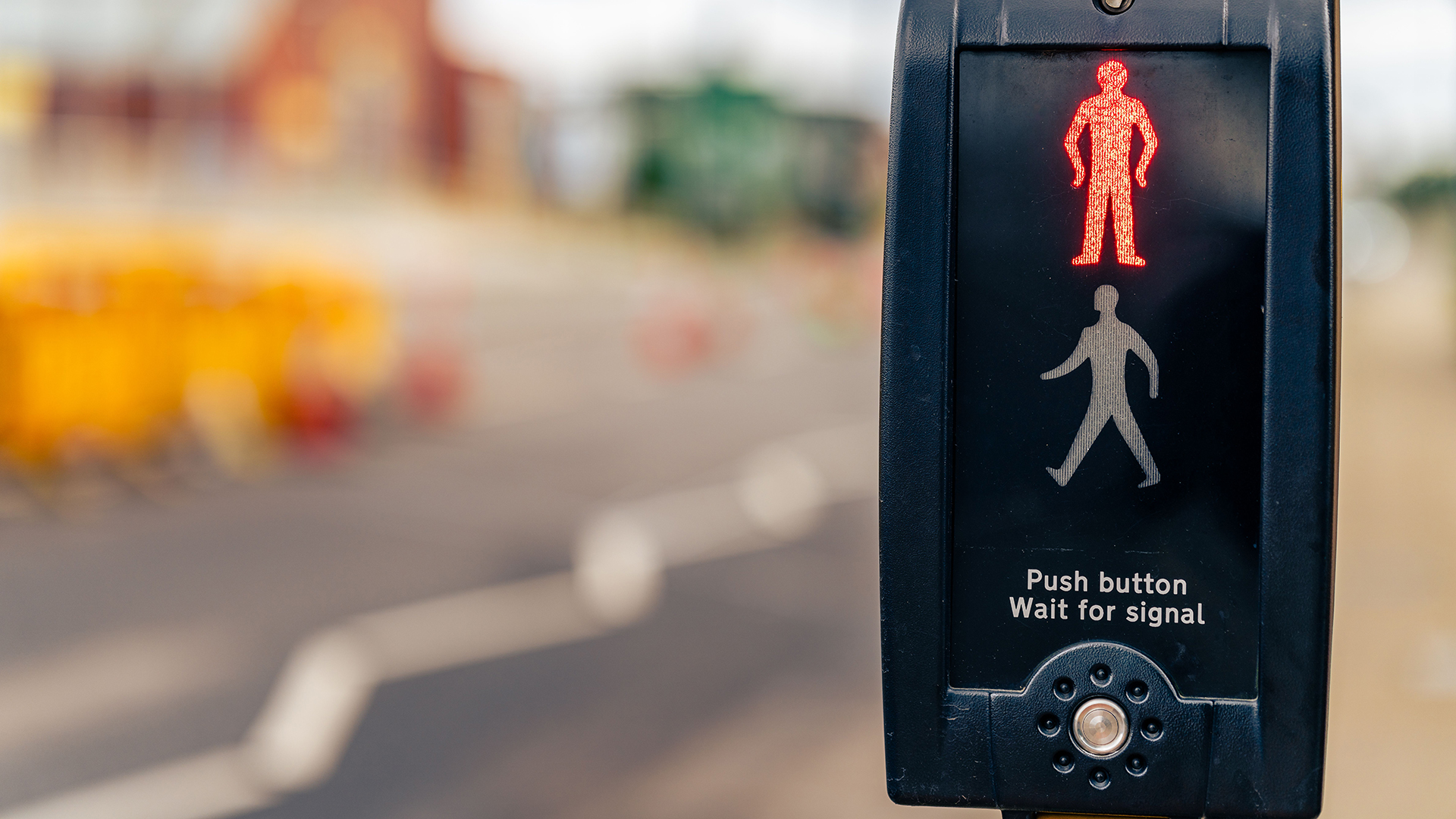 Closeup of a pedestrian crossing button
